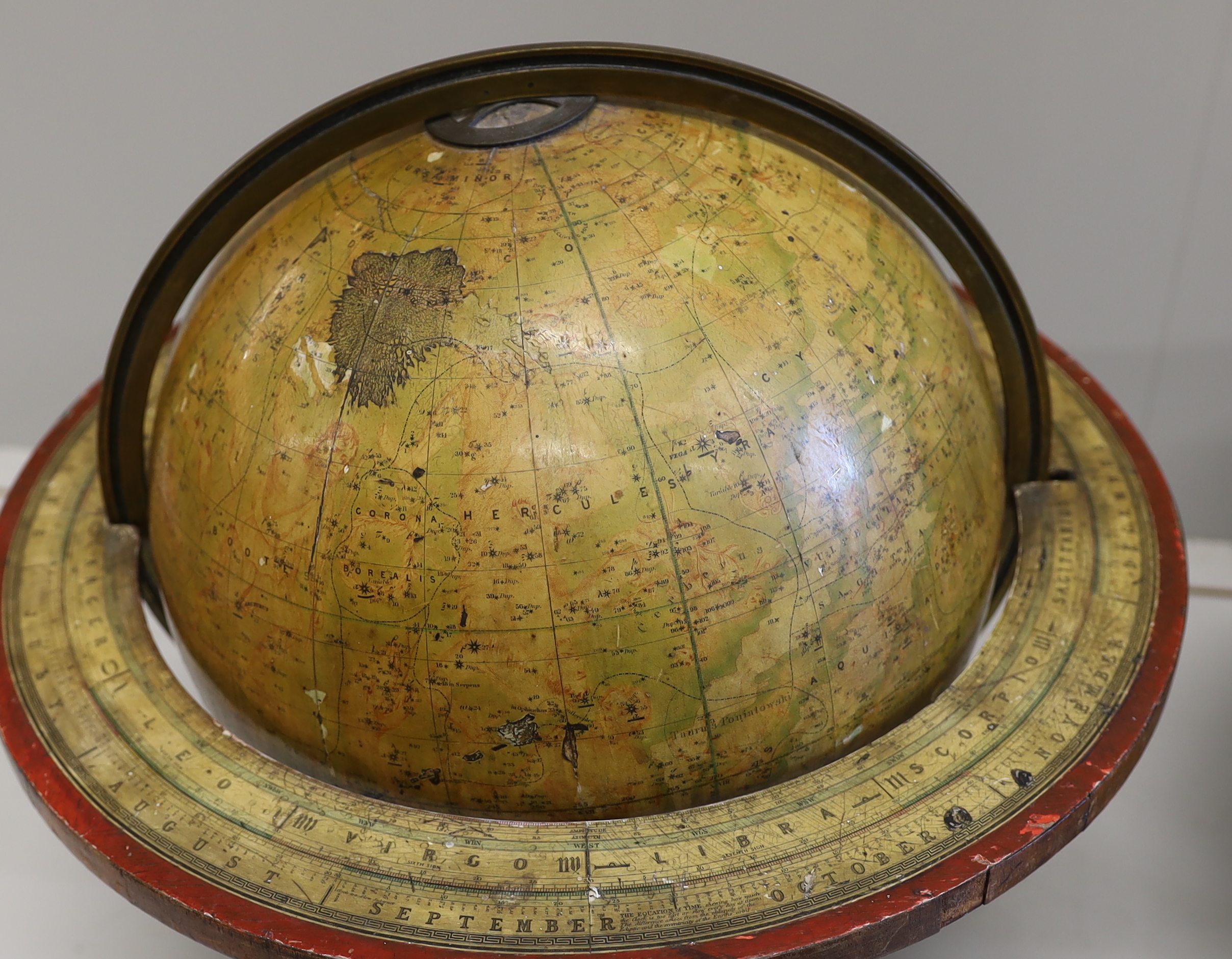 A pair of 19th century 12 inch table top library globes on stands by Malby